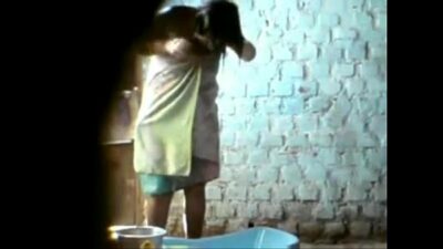 Desi boy records nude bathing of village aunty secretly